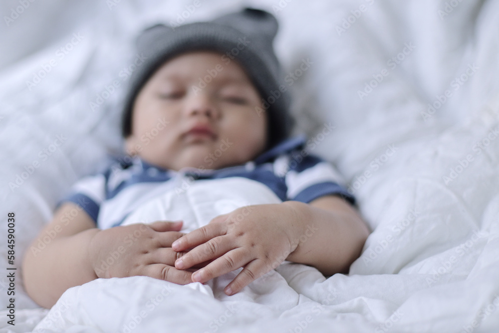 Foto de Safe sleeping for babies. Blurry image of adorable baby boy