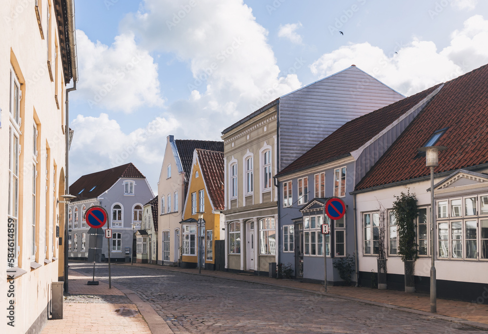 Traditional danish residential old houses along the paved street. Tønder, Southern Denmark (Syddanmark).