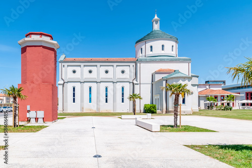 The church of Santa Rosa in Calambrone, Pisa, Italy, on a sunny day photo