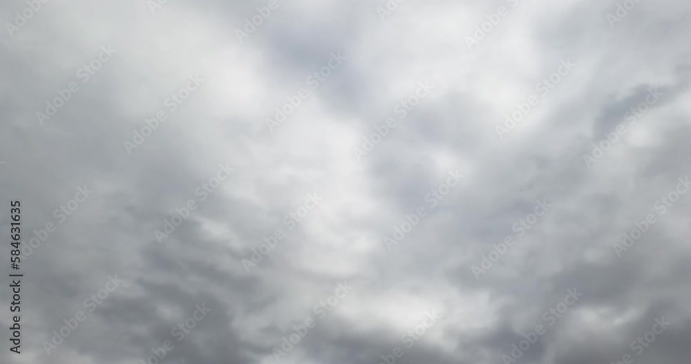 Skies can’t be seen because of grey cloudscape coating the horizon. Low angle view. Timelapse. Skies can’t be seen because of grey cloudscape coating the horizon. Low angle view. Timelapse.