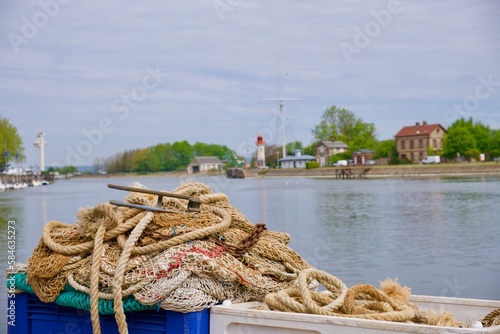 boat on the river with fishing nets