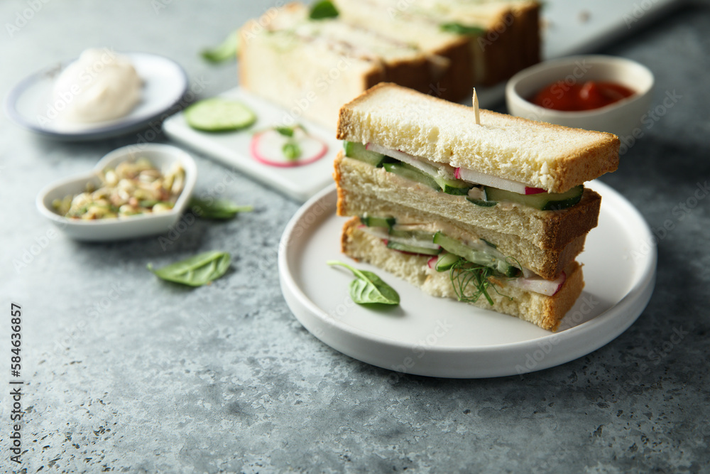 Homemade sandwiches with radish and cucumber