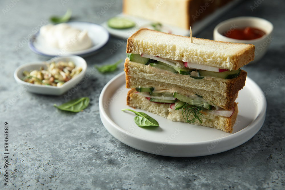Homemade sandwiches with radish and cucumber Homemade sandwiches with radish and cucumber