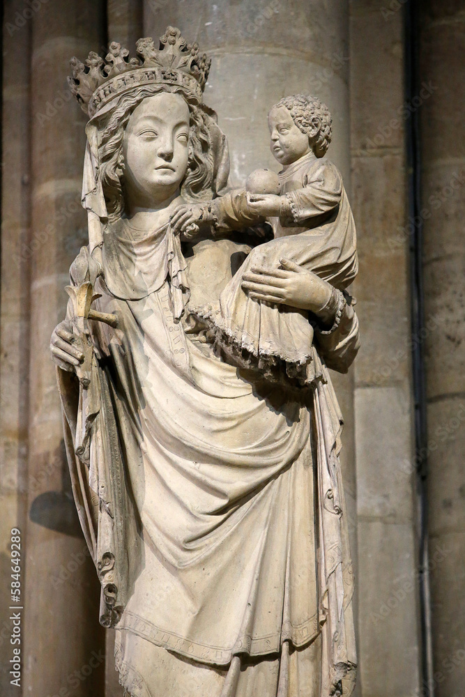 Virgin Mary statue at Notre Dame cathedral, Paris, France.