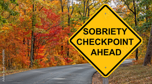 Sobriety Checkpoint Ahead Warning Sign - Autumn Background