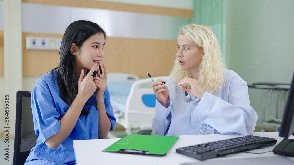 Young beautiful asian woman came to the clinic for consults with plastic surgeon on anti-aging treatments of face Young beautiful asian woman came to the clinic for consults with plastic surgeon on anti-aging treatments of face