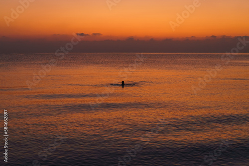 Calm on sea in early morning at sunrise, close-up, tourist concept of vacation by the sea