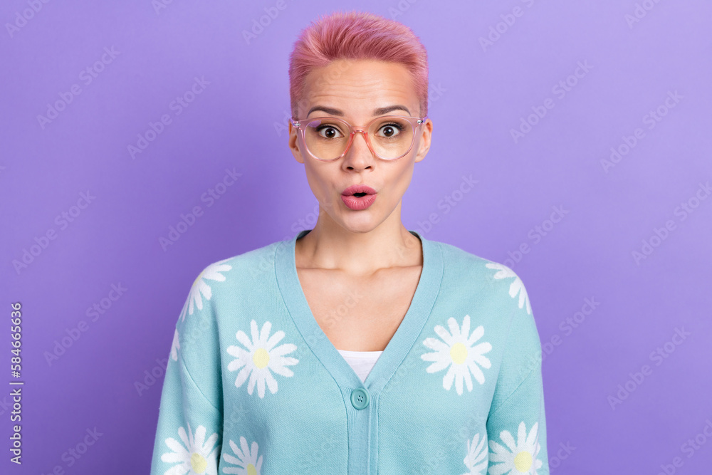 Photo of pleasant astonished woman with short hairstyle dressed blue cardigan impressed staring isolated on purple color background - obrazy, fototapety, plakaty 