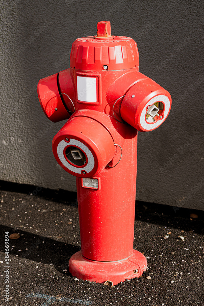 Fire hydrant in a french street in an emergency for firefighter intervention