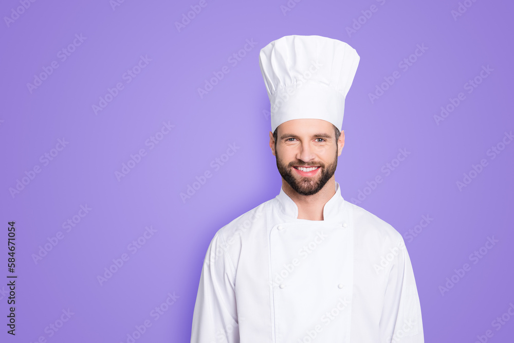 Portrait of cheerful joyful chef cook with stubble in beret and white outfit looking at camera isolated on grey background Portrait of cheerful joyful chef cook with stubble in beret and white outfit looking at camera isolated on grey background