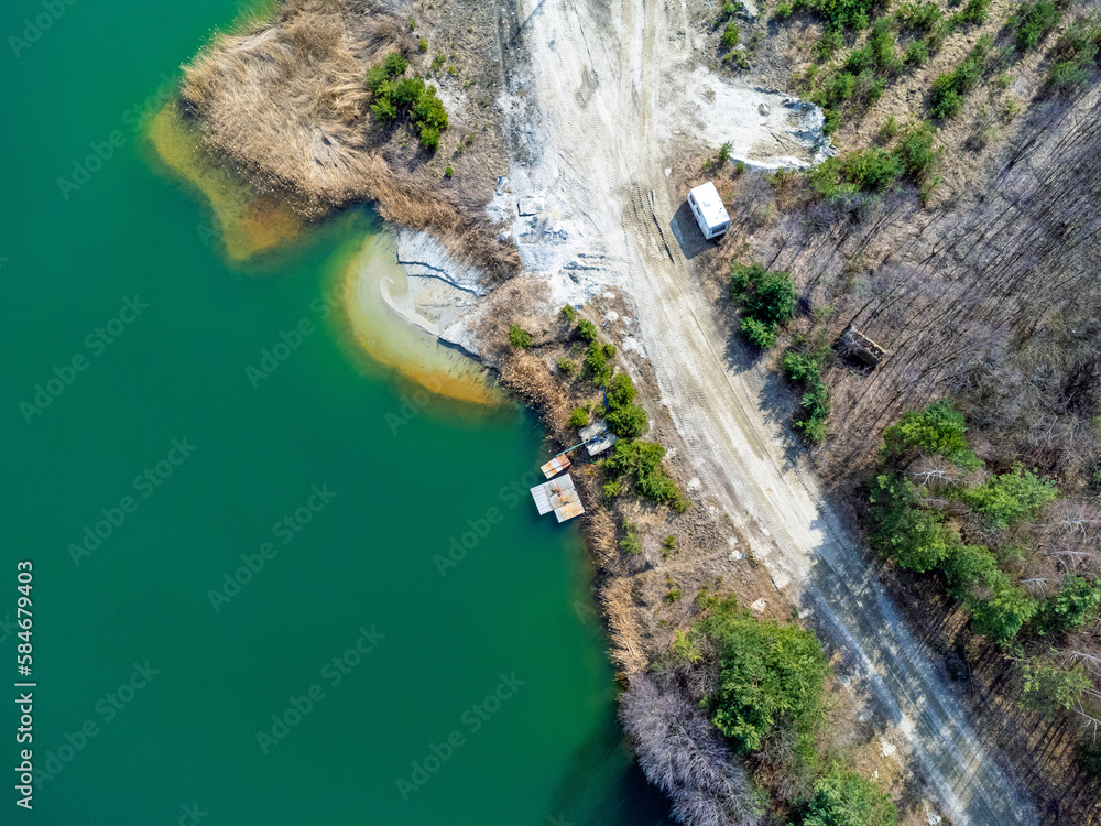 Aerial view landscape. Green water, coast, sand, marina, drone photo.