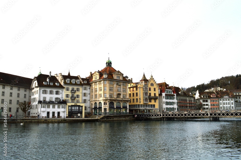 View of Lucerne with the bridge, Wasserturm Tower and the Church of the Jesuits, Lucerne, Switzerland.