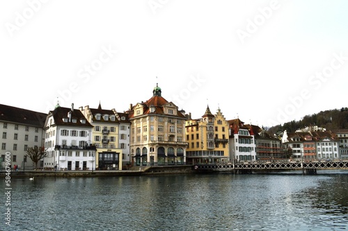 View of Lucerne with the bridge, Wasserturm Tower and the Church of the Jesuits, Lucerne, Switzerland. © Irina Satserdova