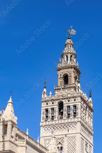 View of tower bell of Seville Cathedral from Santa Cruz neighborhood, in Seville old city center, Andalusia, Spain