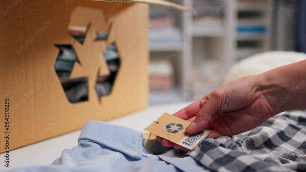 Recyclable items, Young modern woman Active student Touches holding tag