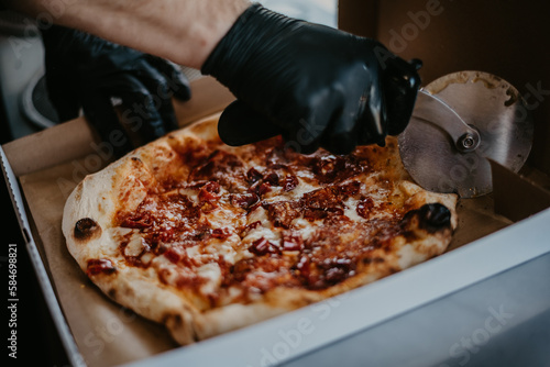 Obraz na płótnie Pizza z pieca opalanego drewnem. w salonie