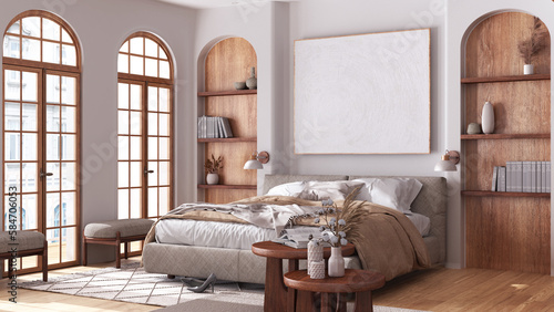 Fototapeta Naklejka Na Ścianę i Meble -  Bedroom in boho style with arched windows and parquet. Master bed with duvet, carpet and side tables in white and beige tones. Farmhouse wooden interior design