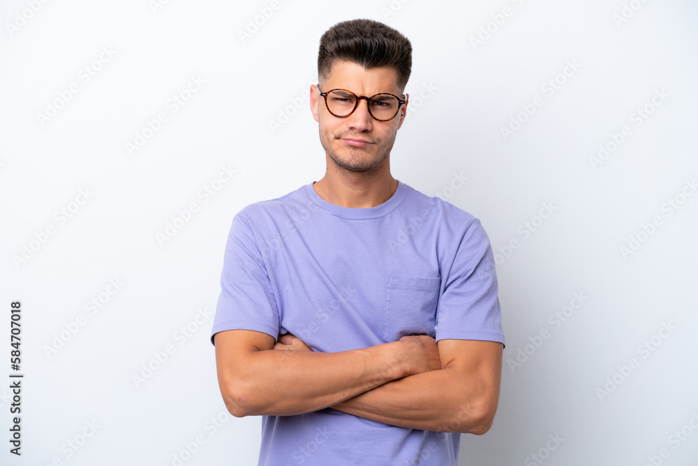 Young caucasian man isolated on white background with unhappy expression Young caucasian man isolated on white background with unhappy expression