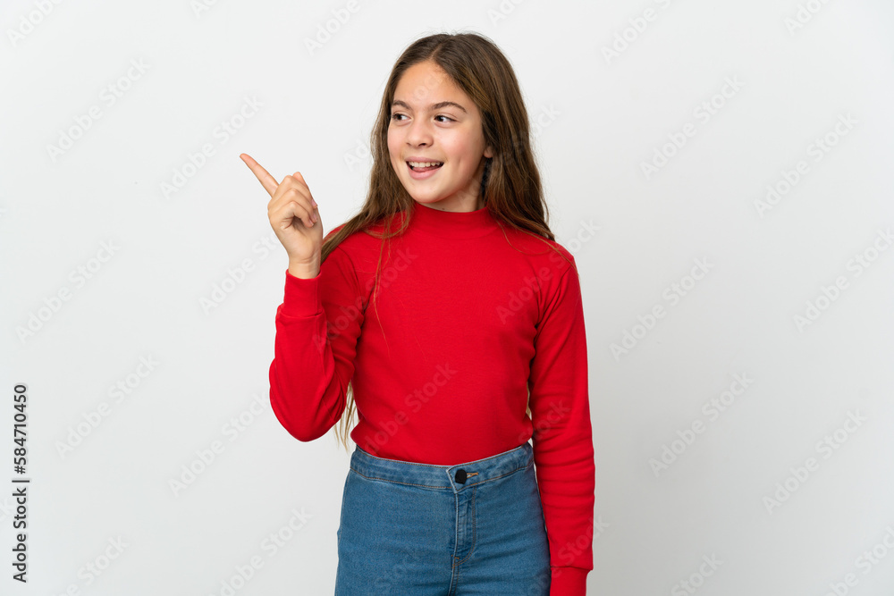 Little girl over isolated white background intending to realizes the solution while lifting a finger up Little girl over isolated white background intending to realizes the solution while lifting a finger up
