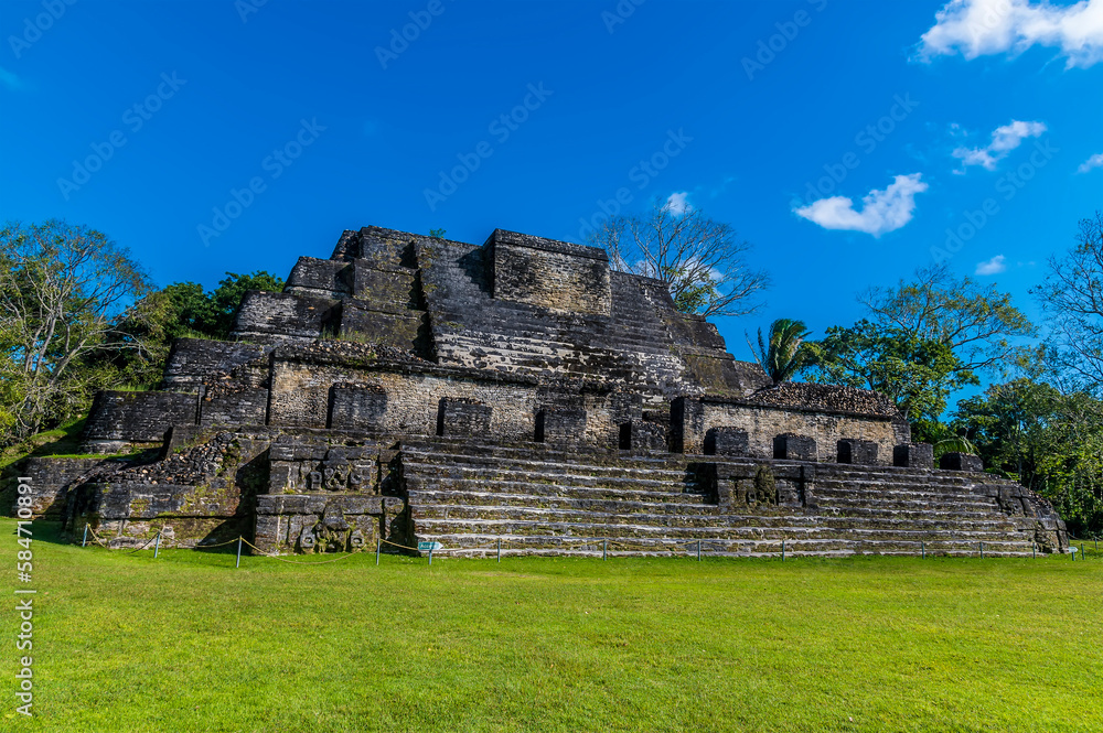 A view towards the Temple of Masonary Altars in the ancient Mayan city ruins in Belize on a sunny day