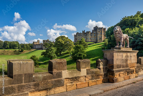 The Lion Bridge over the River Aln in Northumberland, with Alnwick Castle in the background. 