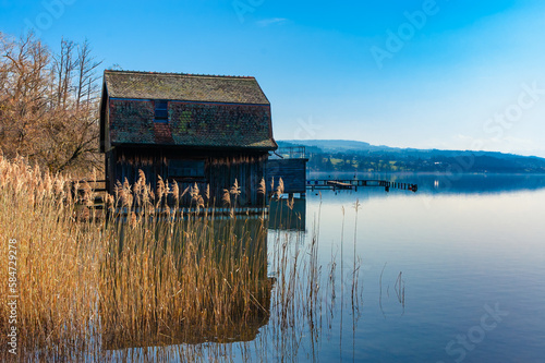 A wooden cabin on Lake Hallwil in Seengen, Switzerland photo