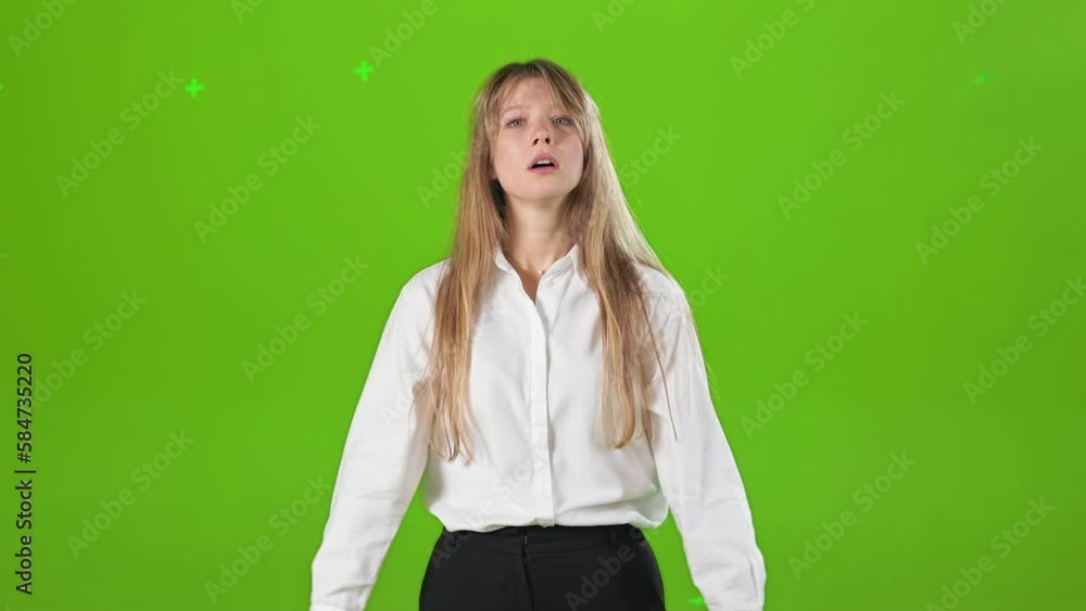 Front view of tired, busy woman standing in studio, looking at camera. Young, blonde lady wearing official clothes, working hard, having headache. Concept of modern lifestyle. Front view of tired, busy woman standing in studio, looking at camera. Young, blonde lady wearing official clothes, working hard, having headache. Concept of modern lifestyle.