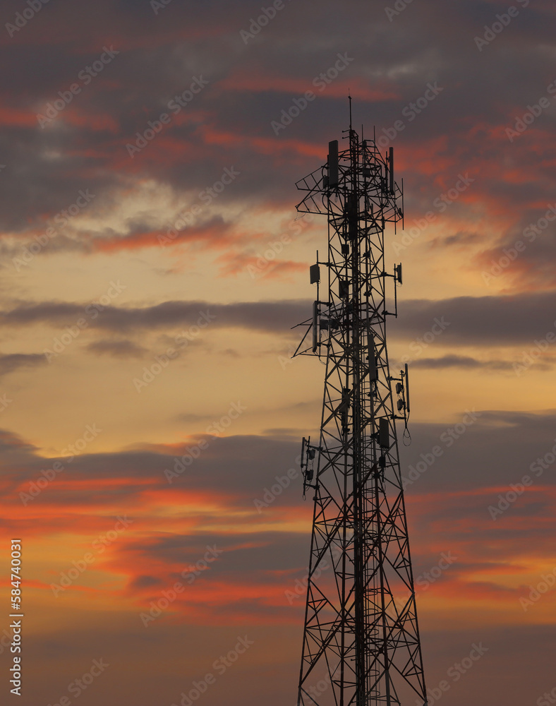 Telephone tower on a twilight sky background. Telephone tower on a twilight sky background.