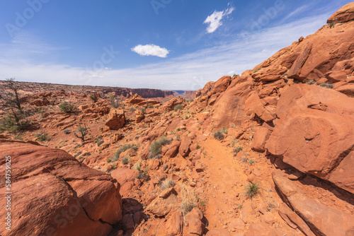 hiking the syncline loop trail in island in the sky district of canyonlands national park, utah, usa