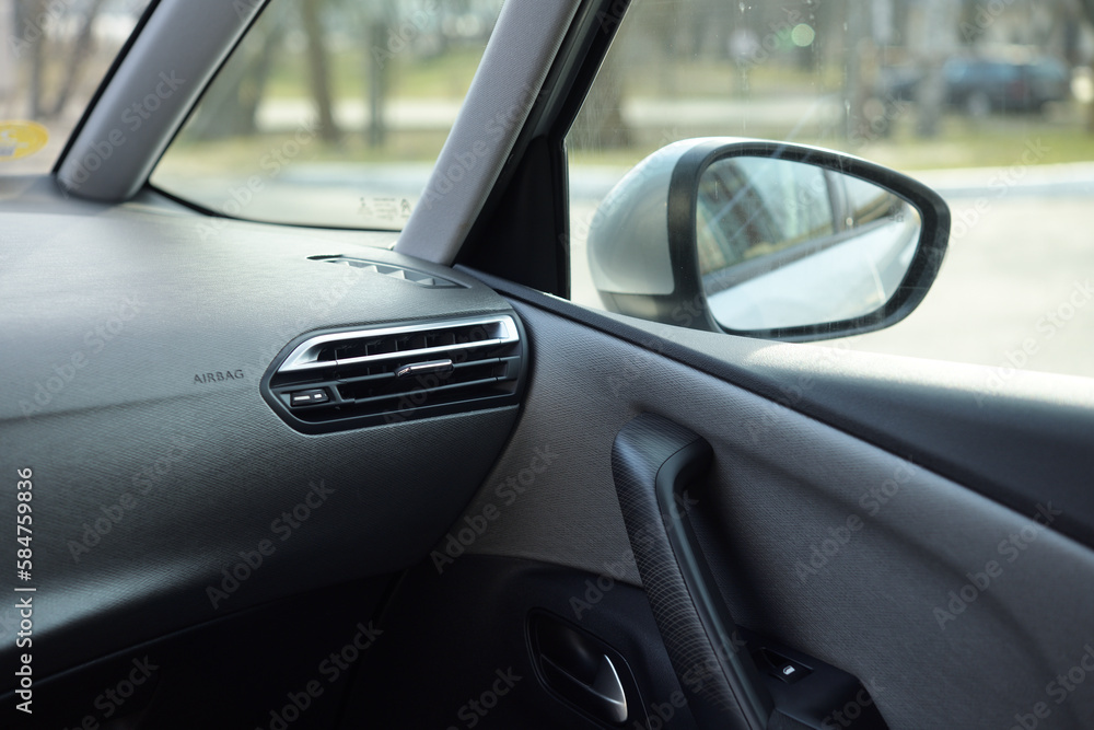 Close-up of the dashboard, adjustment of the blower, air conditioner. Elements of air conditioning and heating in the car. Close-up of the dashboard, adjustment of the blower, air conditioner. Elements of air conditioning and heating in the car.