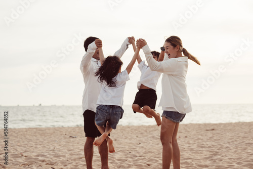 Happy family spending good time together on beach, Family with beach travel