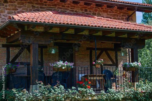 New rustic decorated porch on a large house in the village