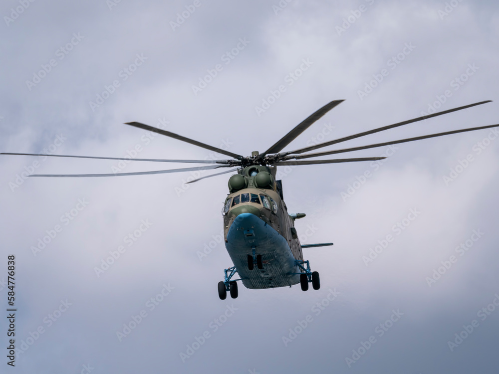Fototapeta premium MOSCOW, RUSSIA - MAY 7, 2021: Avia parade in Moscow. Mi-26 helicopters fly in the sky on parade of Victory in World War II in Moscow, Russia