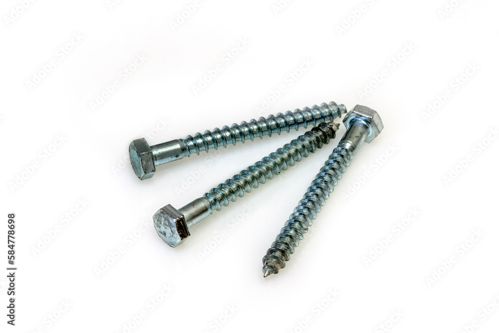 Metal silver screws for construction on a white background isolated screw, background, white