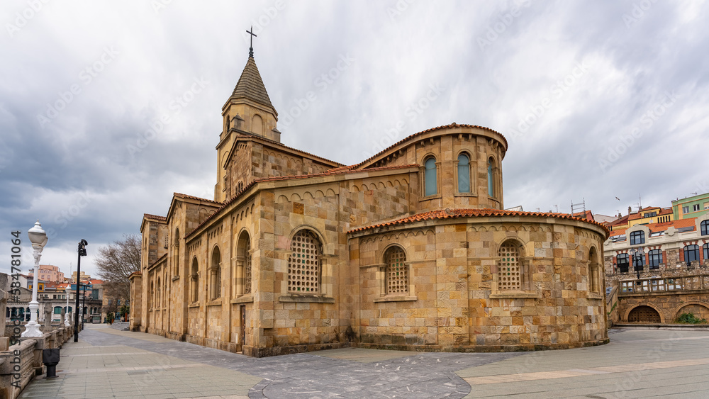 Old church of San Pedro made of stone by the sea in the pretty town of Gijon, Asturias.