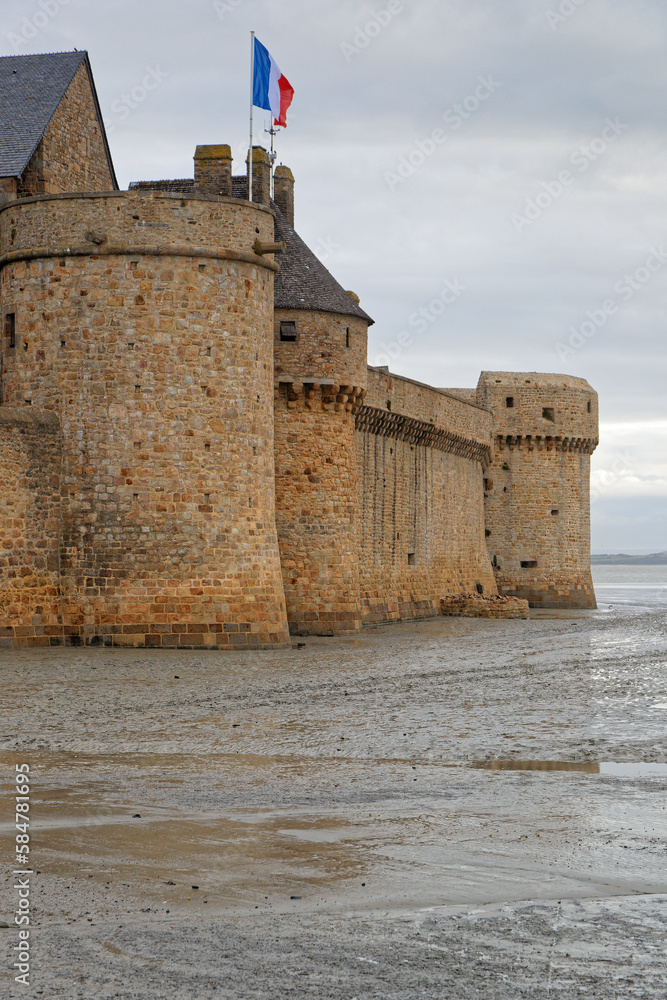 MONT SAINT-MICHEL, FRANCE, September 28, 2019 : The Mont Saint-Michel Abbey ramparts in morning light.