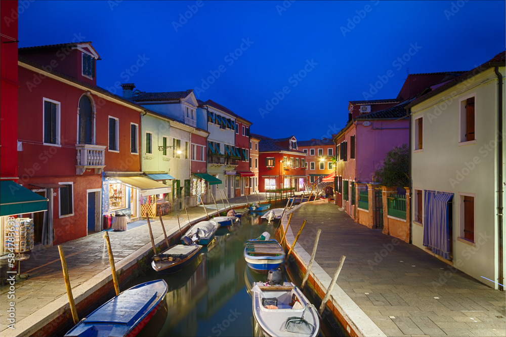 Colorful houses in Burano at dusk, Venice, Italy
