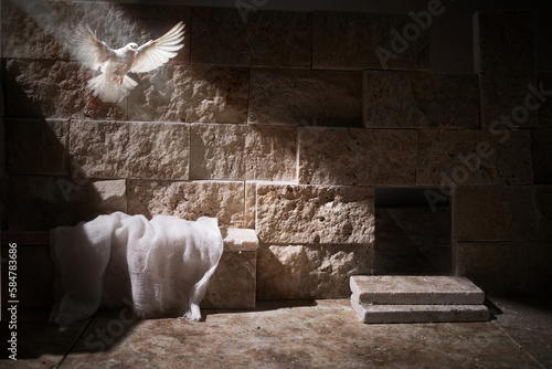 Wall Mural Jesus Christ crucifixion death and resurrection and easter dove flying in a ston