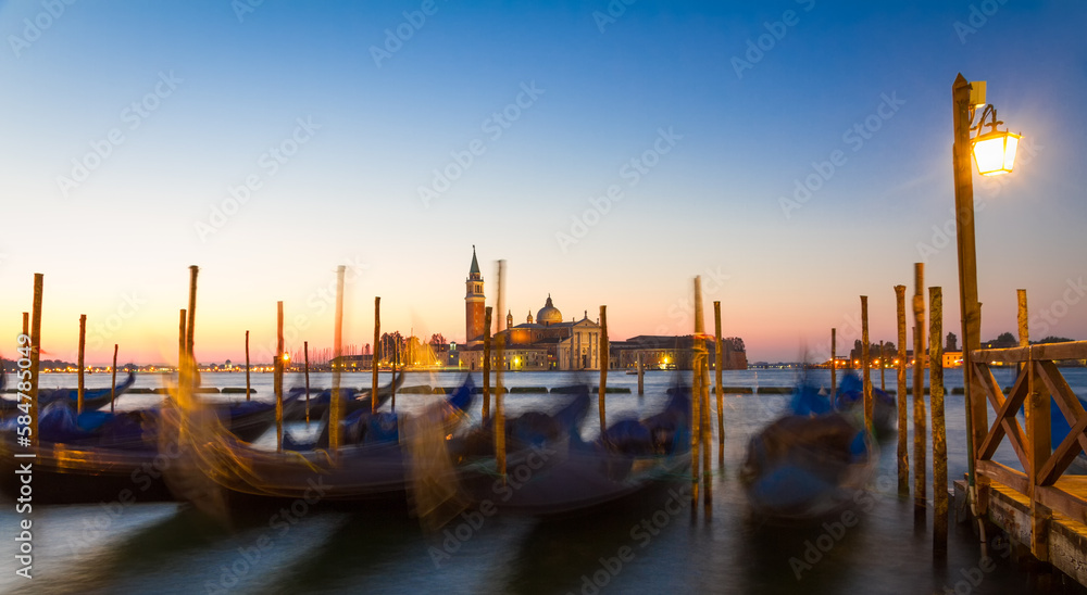 Gondolas at sunrise with San Giorgio di Maggiore church, Venice, Venezia, Italy