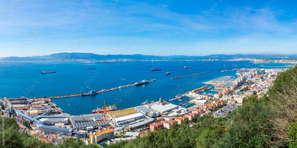 Panoramic  view over Gibraltar - a British Overseas Territory, and Spain across Bay of Gibraltar