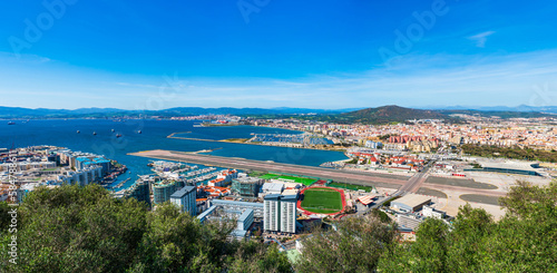 Panoramic  view over Gibraltar - a British Overseas Territory, and Spanish town of La LÃ­inea de la Concepcion on Bay of Gibraltar