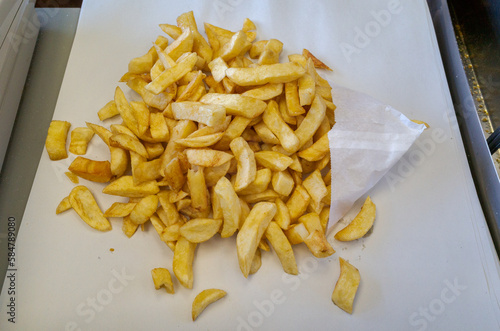 Portion of British chips at fish and chip shop, UK
