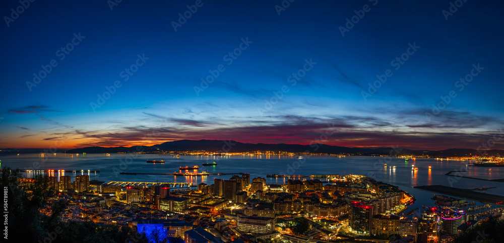 Sunset view over Gibraltar - a British Overseas Territory, and Bay of Gibraltar