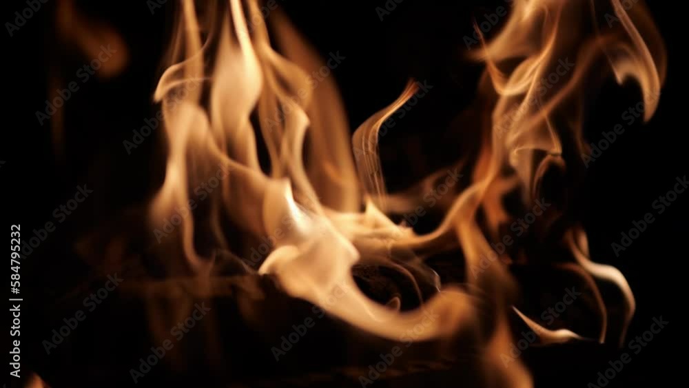 Flames of fire flicker on a black background. Fire hazard. Testura fire. Flames of fire flicker on a black background. Fire hazard. Testura fire.