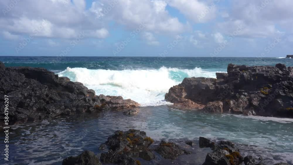 Ocean Waves Crash Against Hawaii's Rocky Shoreline Ocean Waves Crash Against Hawaii's Rocky Shoreline