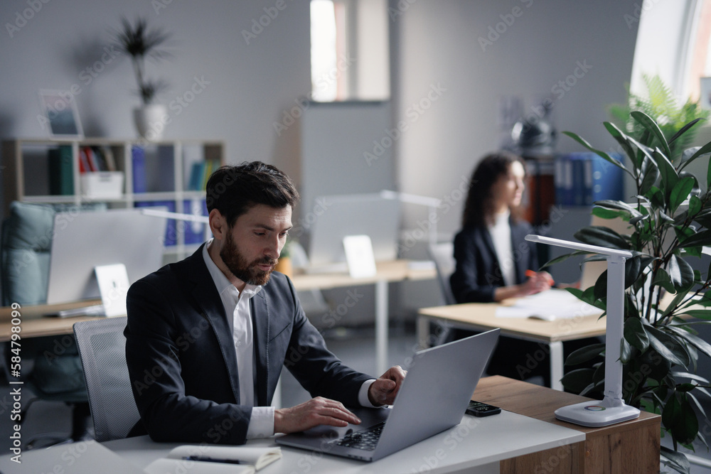 Office workplace. Colleague. Focused trader. Business industry