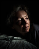 A fictional person. Sleepless Nights: Middle-Aged Woman Experiencing Menopausal Insomnia