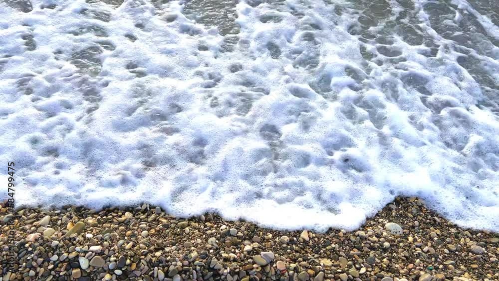Powerful sea waves are crashing on the Black Sea coast. Waves splash on the beach with pebbles during a storm. Storm at sea. Panoramic view of the Black Sea. Russia. Sunset on the beach. 4K Powerful sea waves are crashing on the Black Sea coast. Waves splash on the beach with pebbles during a storm. Storm at sea. Panoramic view of the Black Sea. Russia. Sunset on the beach. 4K