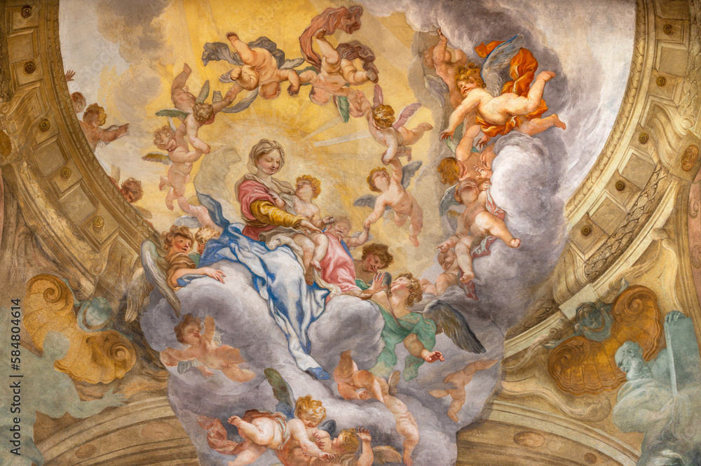 GENOVA, ITALY - MARCH 7, 2023: The fresco of Madonna among the angels in the main apse of church Chiesa di San Luca by Domenico Piola (1627 – 1703).
