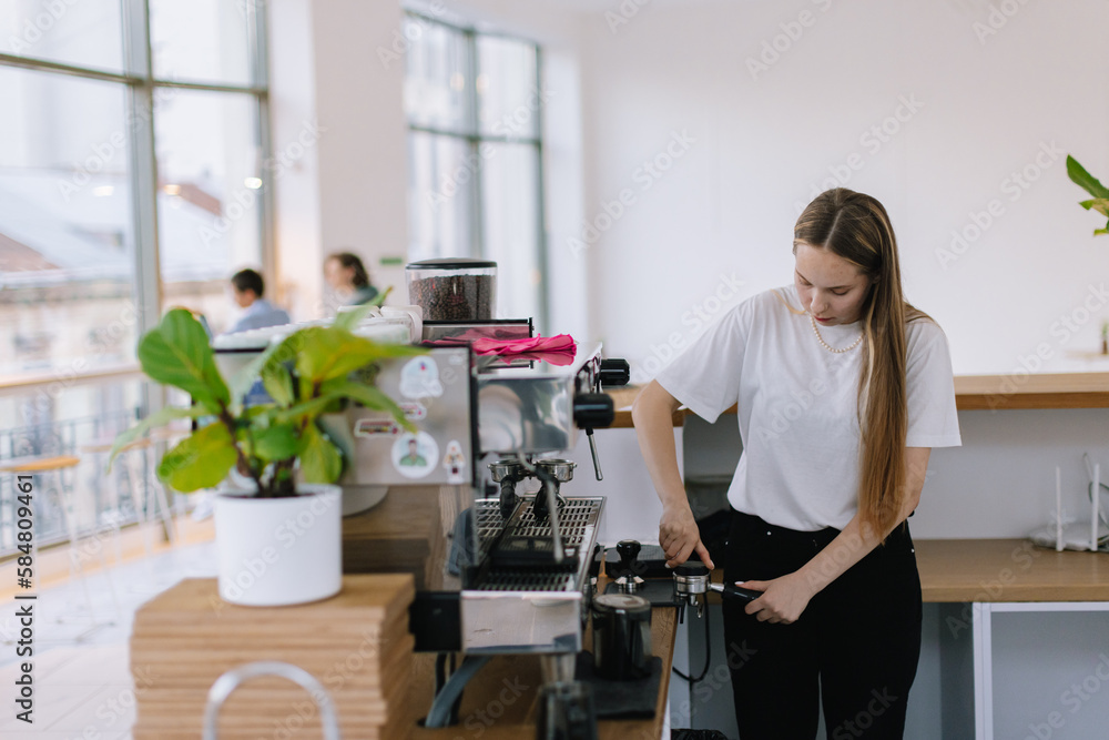 Female Barista Works in Comfy Quiet Cafe Female Barista Works in Comfy Quiet Cafe